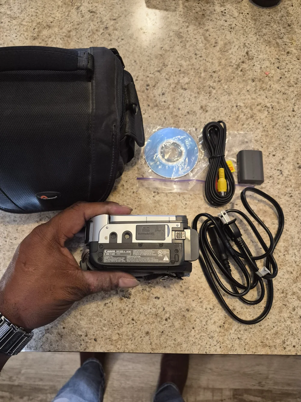 Canon Model # DC-320 Silver DVD Camcorder with Accessories